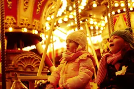 Children and the carousel at the Christmas market