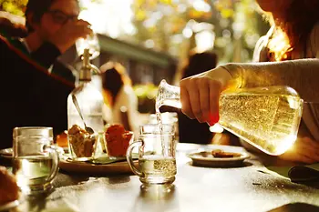 Pouring wine at the heuriger