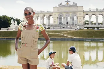 Adia with her kids in front of Gloriette in Vienna