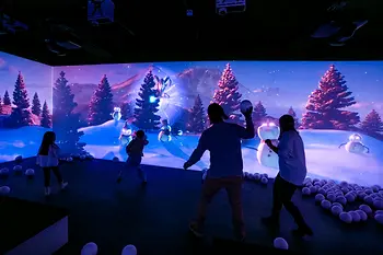 Family having a digital snowball fight