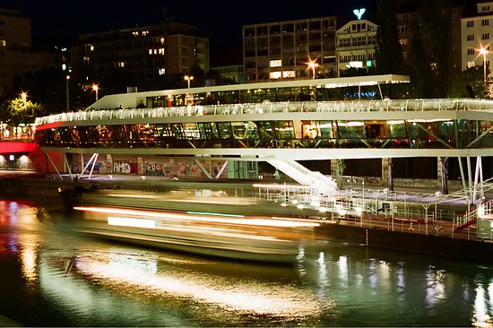 Exterior view of Motto by the river at night